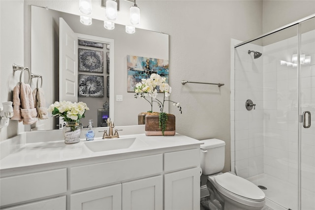 3456 Begonia Ln, Irving, TX 75038 - bathroom featuring toilet, a stall shower, and vanity