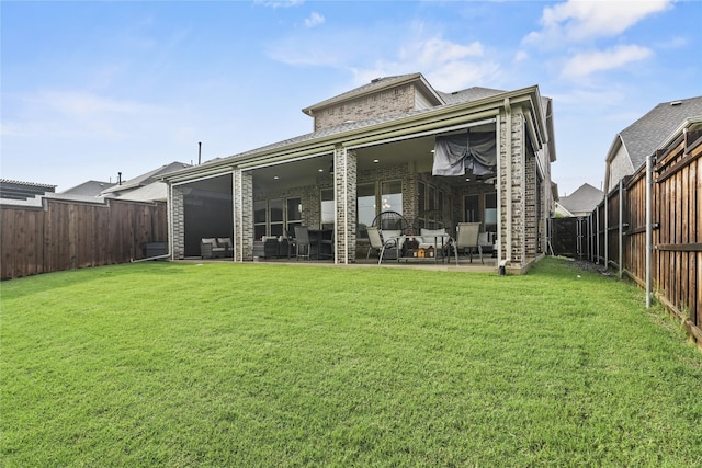 3456 Begonia Ln, Irving, TX 75038 - rear view of house with an outdoor hangout area, a patio, and brick siding