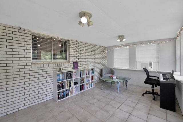 1429 W Water St, Weatherford, TX 76086 - home office featuring brick wall and tile patterned flooring