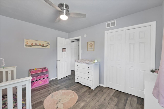 1429 W Water St, Weatherford, TX 76086 - bedroom featuring dark wood-style floors, a closet, baseboards, and ceiling fan