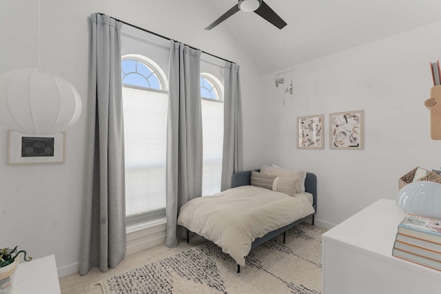 4005 Province Dr, Carrollton, TX 75007 - bedroom featuring vaulted ceiling, a ceiling fan, light wood finished floors, and baseboards