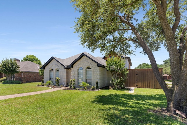 4005 Province Dr, Carrollton, TX 75007 - view of front of property featuring brick siding and a front yard