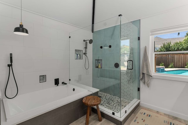 4005 Province Dr, Carrollton, TX 75007 - full bathroom with tiled shower, tiled bath, and baseboards