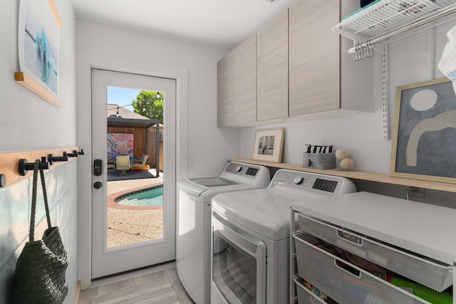 4005 Province Dr, Carrollton, TX 75007 - washroom featuring cabinet space and independent washer and dryer