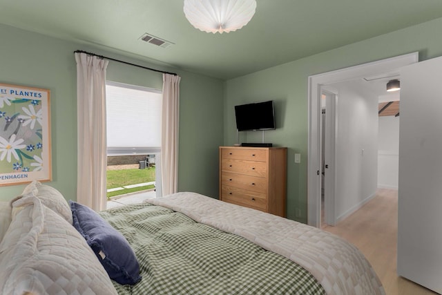 4005 Province Dr, Carrollton, TX 75007 - bedroom featuring wood finished floors and baseboards