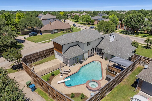 4005 Province Dr, Carrollton, TX 75007 - view of pool featuring a fenced backyard, a diving board, a residential view, a pool with connected hot tub, and a patio
