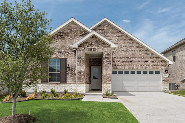 3404 Riverlawn Dr, Anna, TX 75409 - view of front of house with a garage, central air condition unit, concrete driveway, a front yard, and brick siding