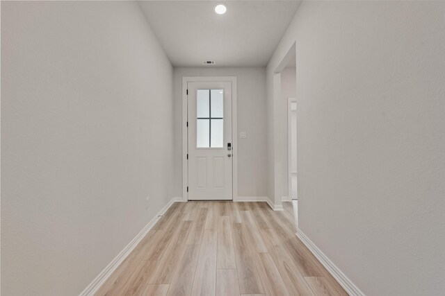 3404 Riverlawn Dr, Anna, TX 75409 - doorway to outside featuring light wood-style floors and baseboards