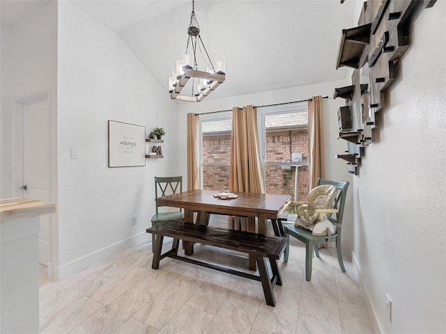 12200 Rolling Ridge Dr, Fort Worth, TX 76028 - dining room featuring baseboards, vaulted ceiling, a chandelier, and light marble finish flooring