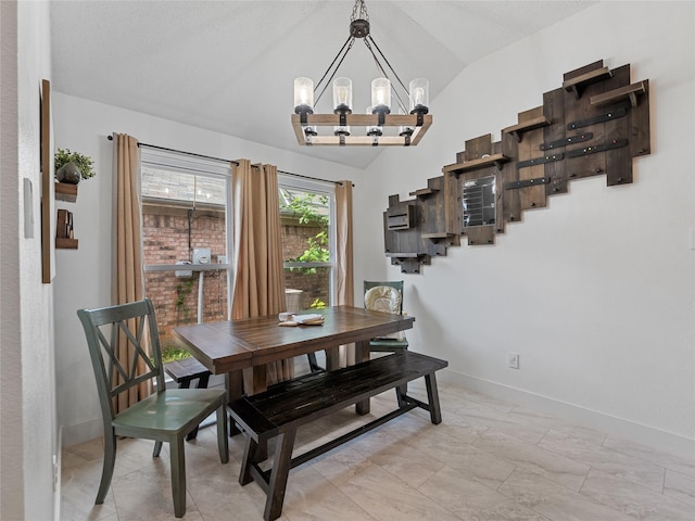12200 Rolling Ridge Dr, Fort Worth, TX 76028 - dining area featuring a chandelier, vaulted ceiling, and baseboards