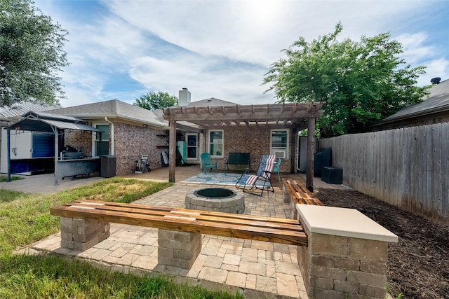 12200 Rolling Ridge Dr, Fort Worth, TX 76028 - rear view of house with an outdoor fire pit, a gazebo, a patio area, a chimney, and a fenced backyard