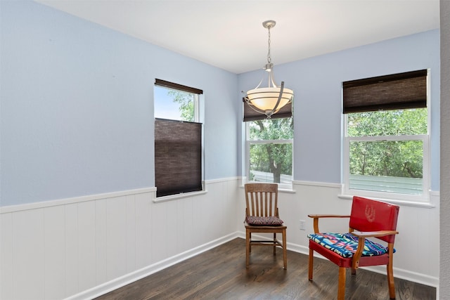 1701 Lawther Dr, River Oaks, TX 76114 - sitting room with wood finished floors and a wainscoted wall