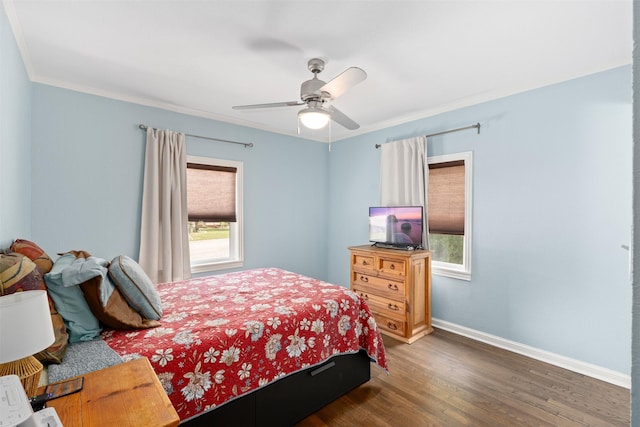 1701 Lawther Dr, River Oaks, TX 76114 - bedroom featuring multiple windows, wood finished floors, baseboards, ornamental molding, and ceiling fan