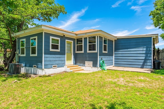 1701 Lawther Dr, River Oaks, TX 76114 - view of front facade with entry steps, central AC unit, and a front lawn