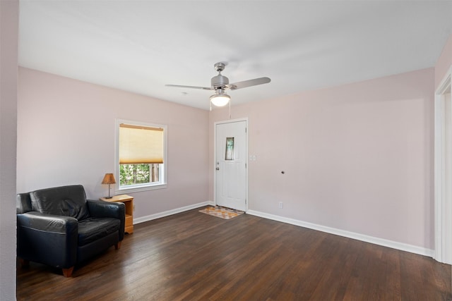 1701 Lawther Dr, River Oaks, TX 76114 - living area featuring dark wood-style floors, baseboards, and a ceiling fan