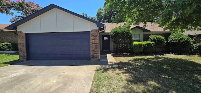 6648 Inwood Dr, Watauga, TX 76148 - ranch-style home featuring an attached garage, driveway, a front lawn, and brick siding