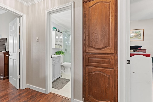 10161 Aragon Dr, Waco, TX 76708 - bathroom with wood finished floors, vanity, baseboards, toilet, and a shower