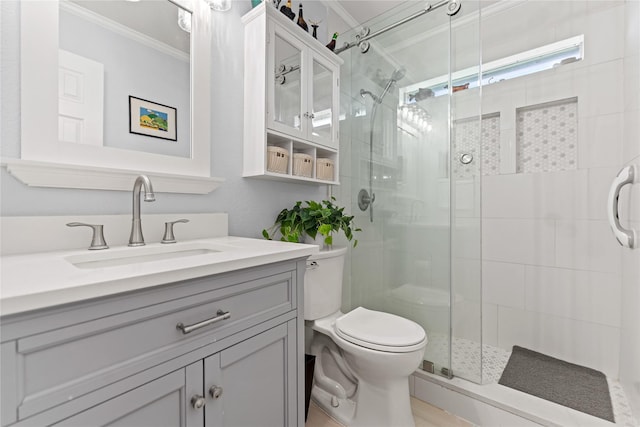 10161 Aragon Dr, Waco, TX 76708 - full bath featuring crown molding, toilet, vanity, and a shower stall