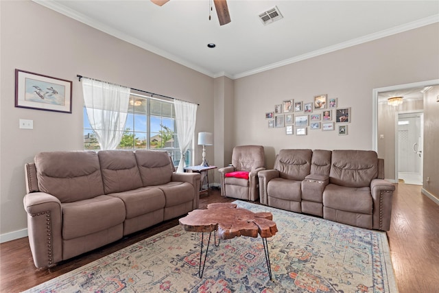 10161 Aragon Dr, Waco, TX 76708 - living room featuring wood finished floors, ornamental molding, ceiling fan, and baseboards