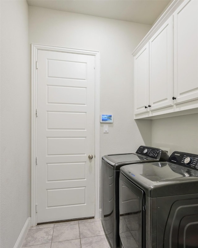 3812 Ironbark Way, Mckinney, TX 75071 - washroom with washing machine and dryer, cabinet space, baseboards, and light tile patterned floors
