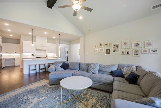 3812 Ironbark Way, Mckinney, TX 75071 - living area featuring dark wood-style floors, recessed lighting, a ceiling fan, beam ceiling, and high vaulted ceiling