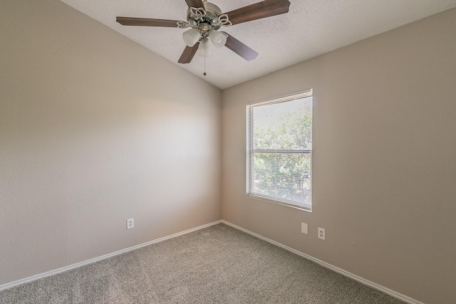 3733 River Birch Rd, Fort Worth, TX 76137 - empty room with carpet floors, lofted ceiling, baseboards, a textured ceiling, and a ceiling fan