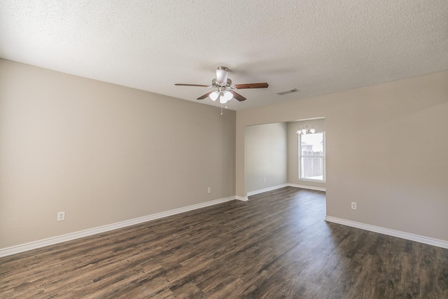 3733 River Birch Rd, Fort Worth, TX 76137 - spare room with ceiling fan, dark wood finished floors, baseboards, and a textured ceiling