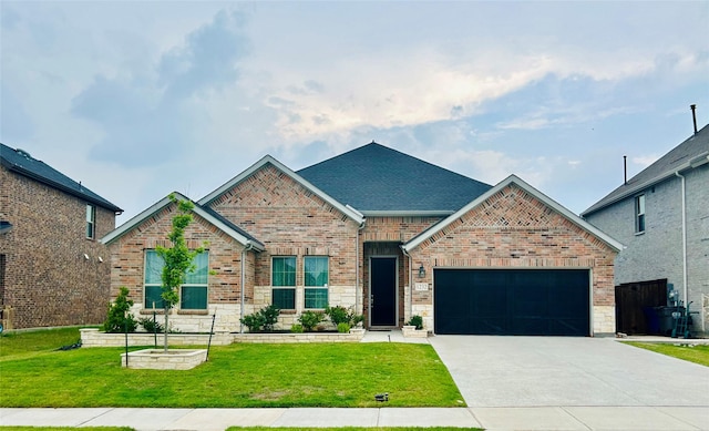 1232 Xeresa Dr, Little Elm, TX 75068 - view of front of property with a garage, driveway, a front yard, and brick siding