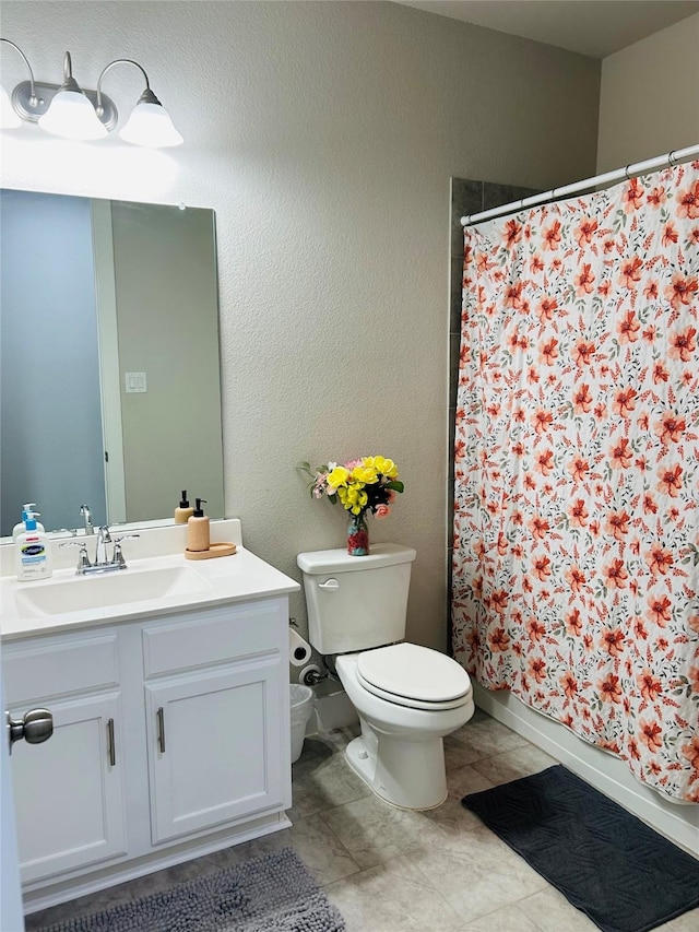 1232 Xeresa Dr, Little Elm, TX 75068 - full bathroom with toilet, vanity, and a shower with shower curtain