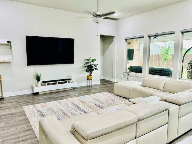 1232 Xeresa Dr, Little Elm, TX 75068 - living area featuring baseboards, ceiling fan, and wood finished floors