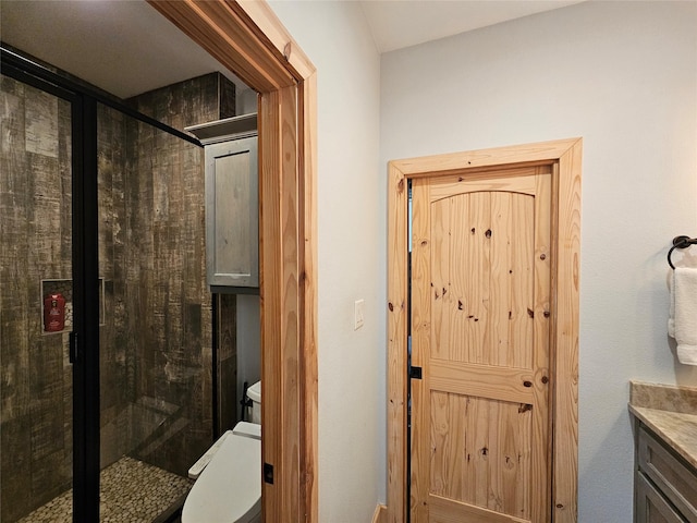 437 County Road 3190, Winnsboro, TX 75494 - full bath featuring a shower stall, vanity, and toilet