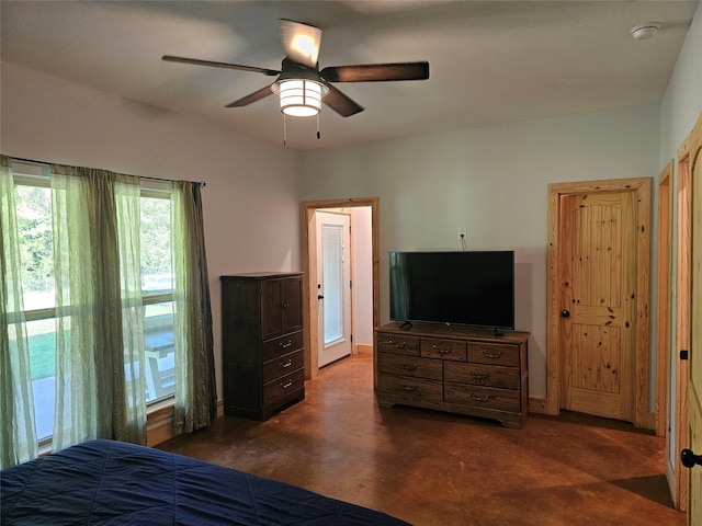437 County Road 3190, Winnsboro, TX 75494 - bedroom featuring ceiling fan and concrete floors