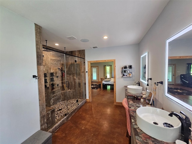 437 County Road 3190, Winnsboro, TX 75494 - full bathroom with a stall shower, finished concrete flooring, recessed lighting, and two vanities
