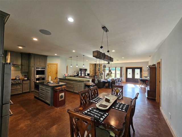437 County Road 3190, Winnsboro, TX 75494 - dining room with concrete flooring, recessed lighting, and baseboards