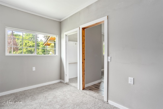 2383 Julia St, Bossier City, LA 71112 - unfurnished bedroom featuring carpet flooring, baseboards, and ornamental molding
