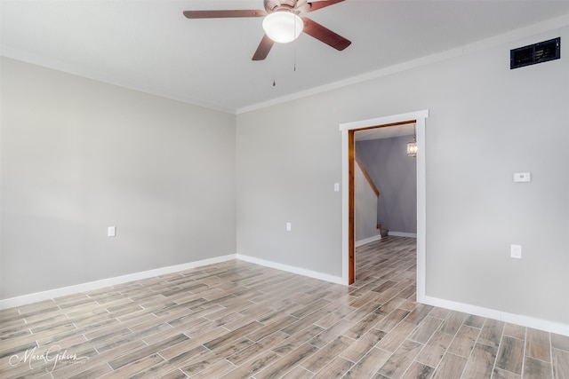 2383 Julia St, Bossier City, LA 71112 - unfurnished room with a ceiling fan, light wood-type flooring, baseboards, and ornamental molding
