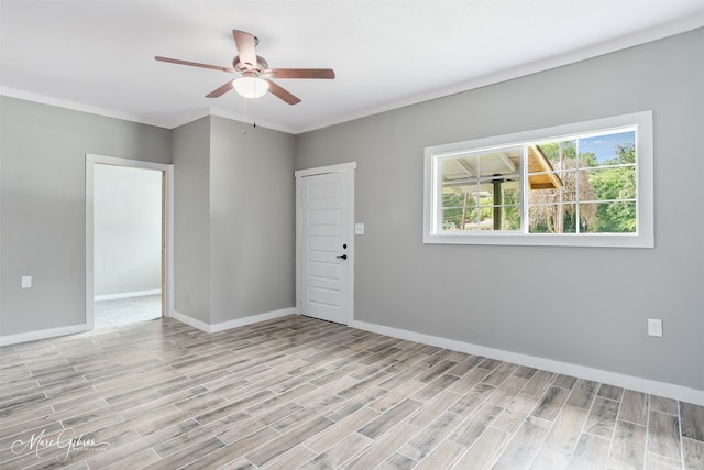 2383 Julia St, Bossier City, LA 71112 - spare room featuring ceiling fan, light wood-style floors, and baseboards