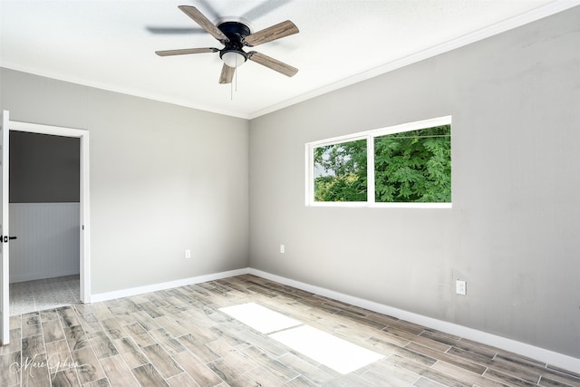 2383 Julia St, Bossier City, LA 71112 - empty room with wood tiled floors, ceiling fan, baseboards, and ornamental molding
