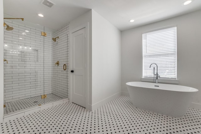 1614 Engle Ave, Dallas, TX 75224 - full bath featuring a stall shower, a freestanding bath, baseboards, and recessed lighting