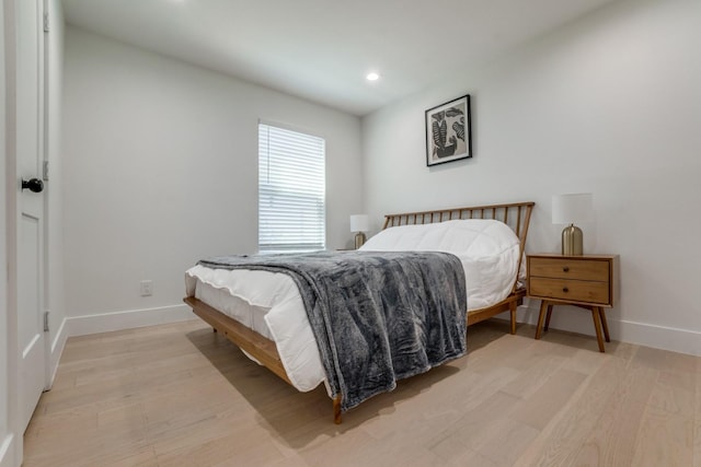 1614 Engle Ave, Dallas, TX 75224 - bedroom featuring light wood-style floors, recessed lighting, and baseboards