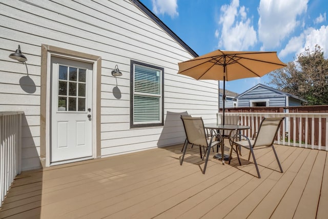 1614 Engle Ave, Dallas, TX 75224 - wooden terrace with outdoor dining space