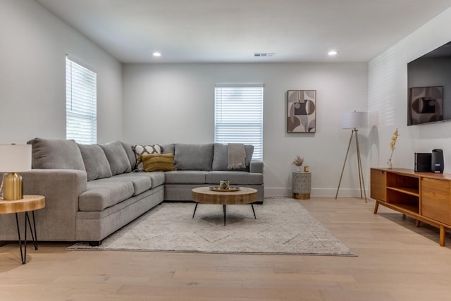 1614 Engle Ave, Dallas, TX 75224 - living room featuring recessed lighting, wood finished floors, and baseboards