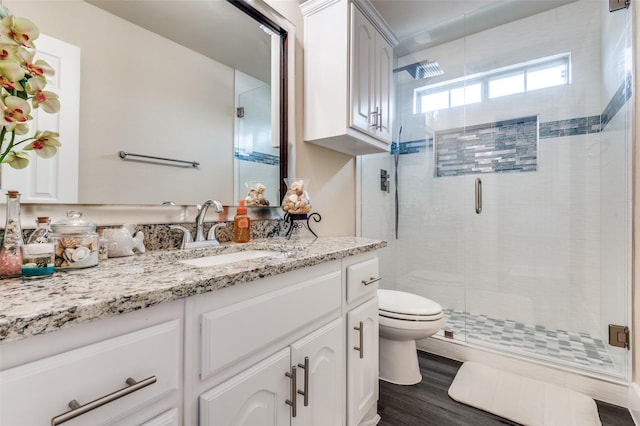 2828 Pino, Grand Prairie, TX 75054 - full bath featuring vanity, a stall shower, and wood finished floors