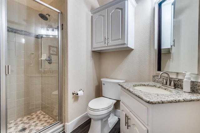2828 Pino, Grand Prairie, TX 75054 - bathroom featuring vanity, a stall shower, and wood finished floors