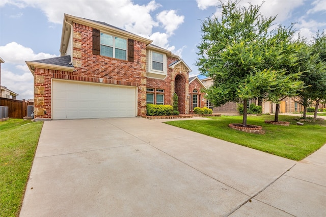 2828 Pino, Grand Prairie, TX 75054 - traditional home featuring brick siding, concrete driveway, and a garage