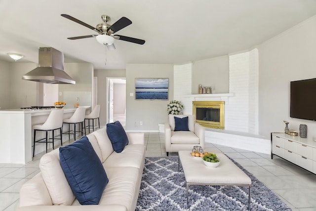 5001 N Colony Blvd, The Colony, TX 75056 - tiled living room featuring ceiling fan and a brick fireplace