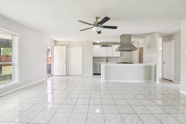 5001 N Colony Blvd, The Colony, TX 75056 - unfurnished living room with ceiling fan, baseboards, and light tile patterned flooring