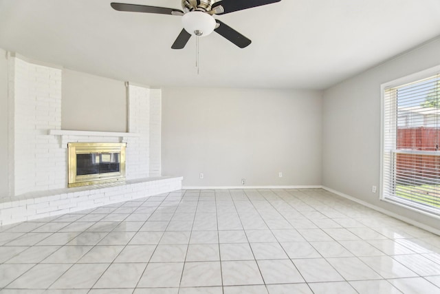 5001 N Colony Blvd, The Colony, TX 75056 - unfurnished living room with baseboards, ceiling fan, a fireplace, and crown molding