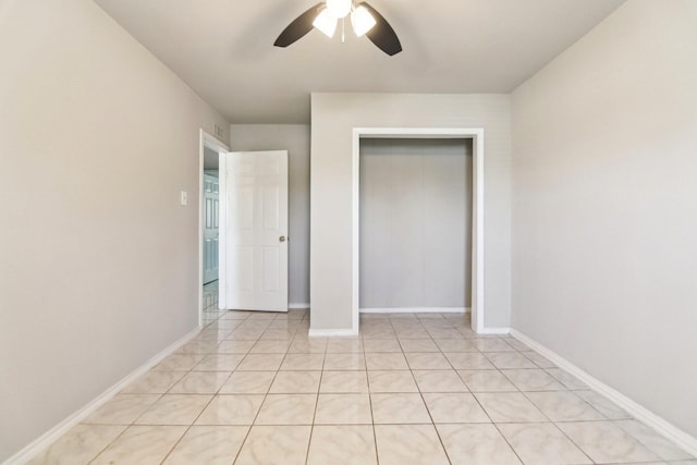 5001 N Colony Blvd, The Colony, TX 75056 - unfurnished bedroom featuring ceiling fan and baseboards