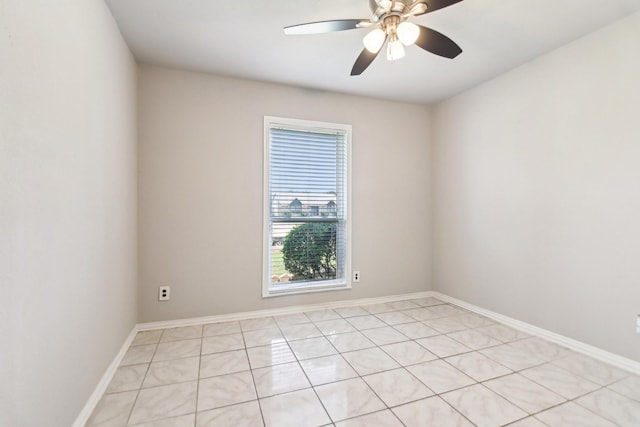 5001 N Colony Blvd, The Colony, TX 75056 - spare room with ceiling fan, light tile patterned flooring, and baseboards